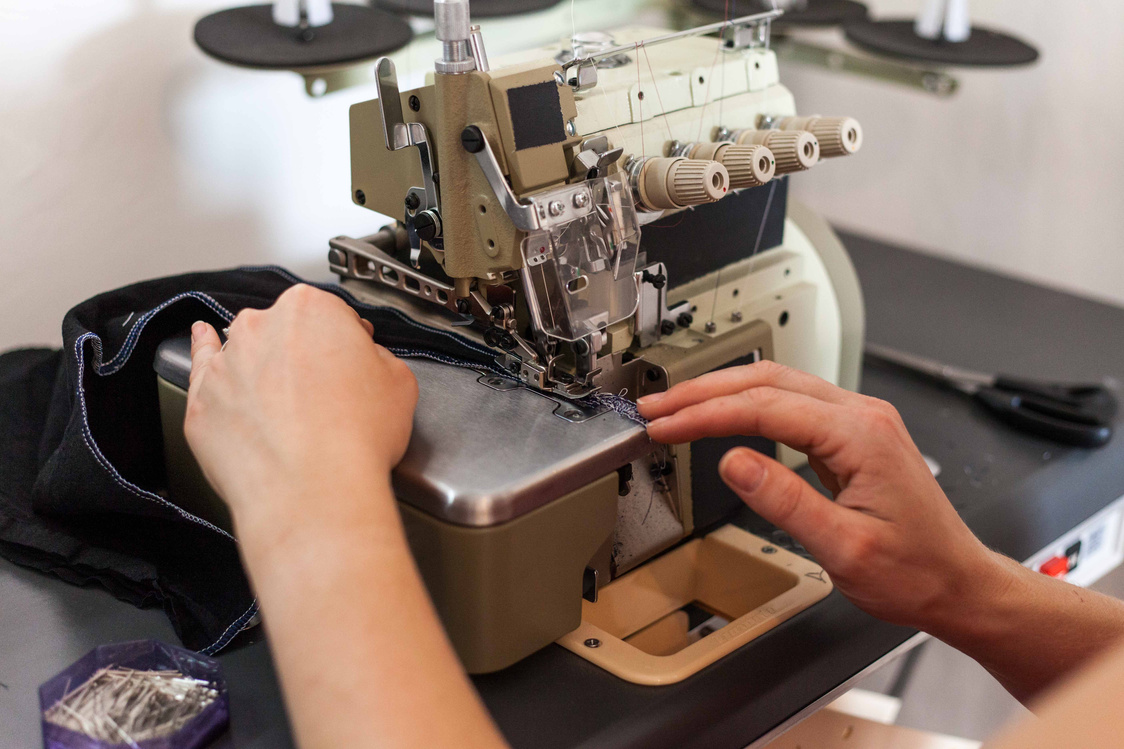 A Person Using a Sewing Machine